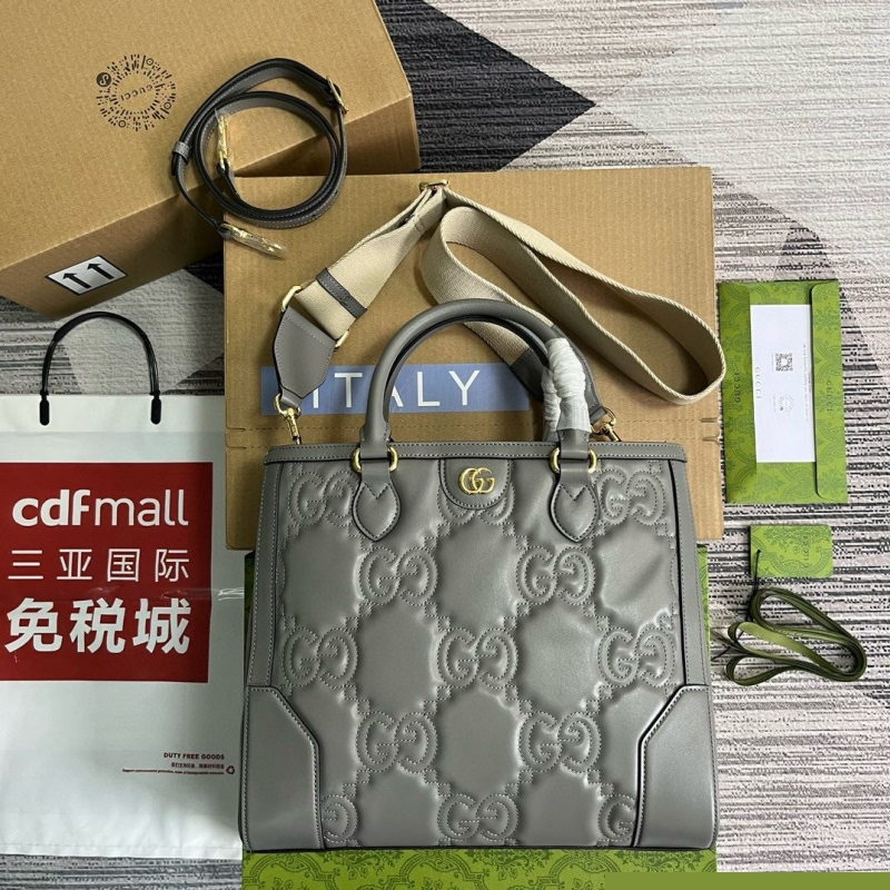 G*u*i top handle bags
